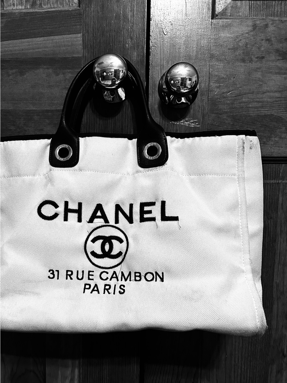 CHANEL White Canvas Tote with Black Handles and Logo